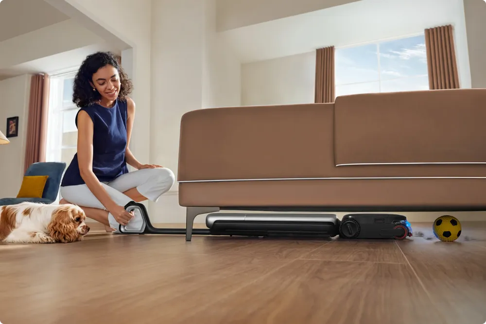 Reach under low furniture at full power